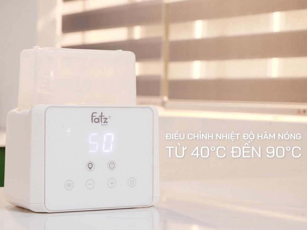 máy hâm sữa và tiệt trùng  