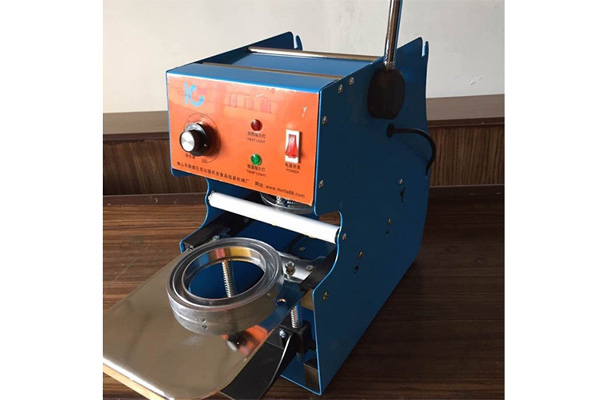 Máy dán miệng cốc IC-27