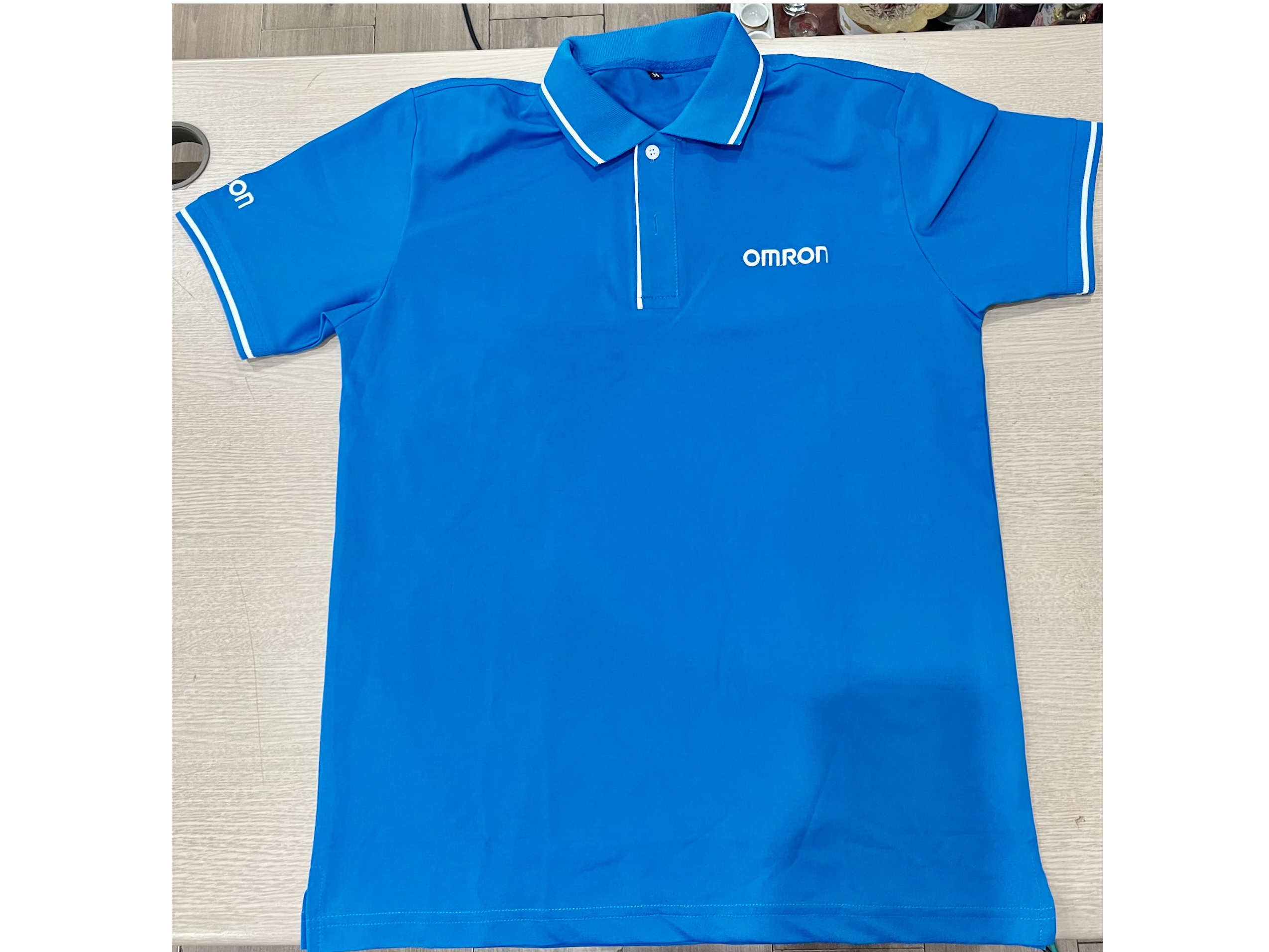 Áo thun Polo Omron
