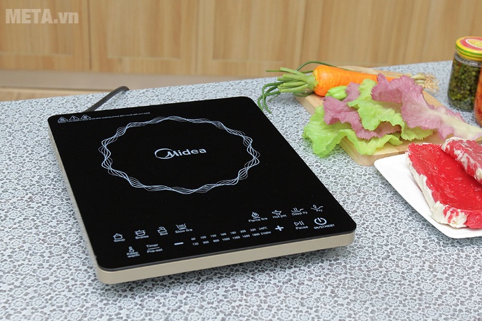 Bếp từ cảm ứng Midea MI-T2114DC có tông màu đen sang trọng.